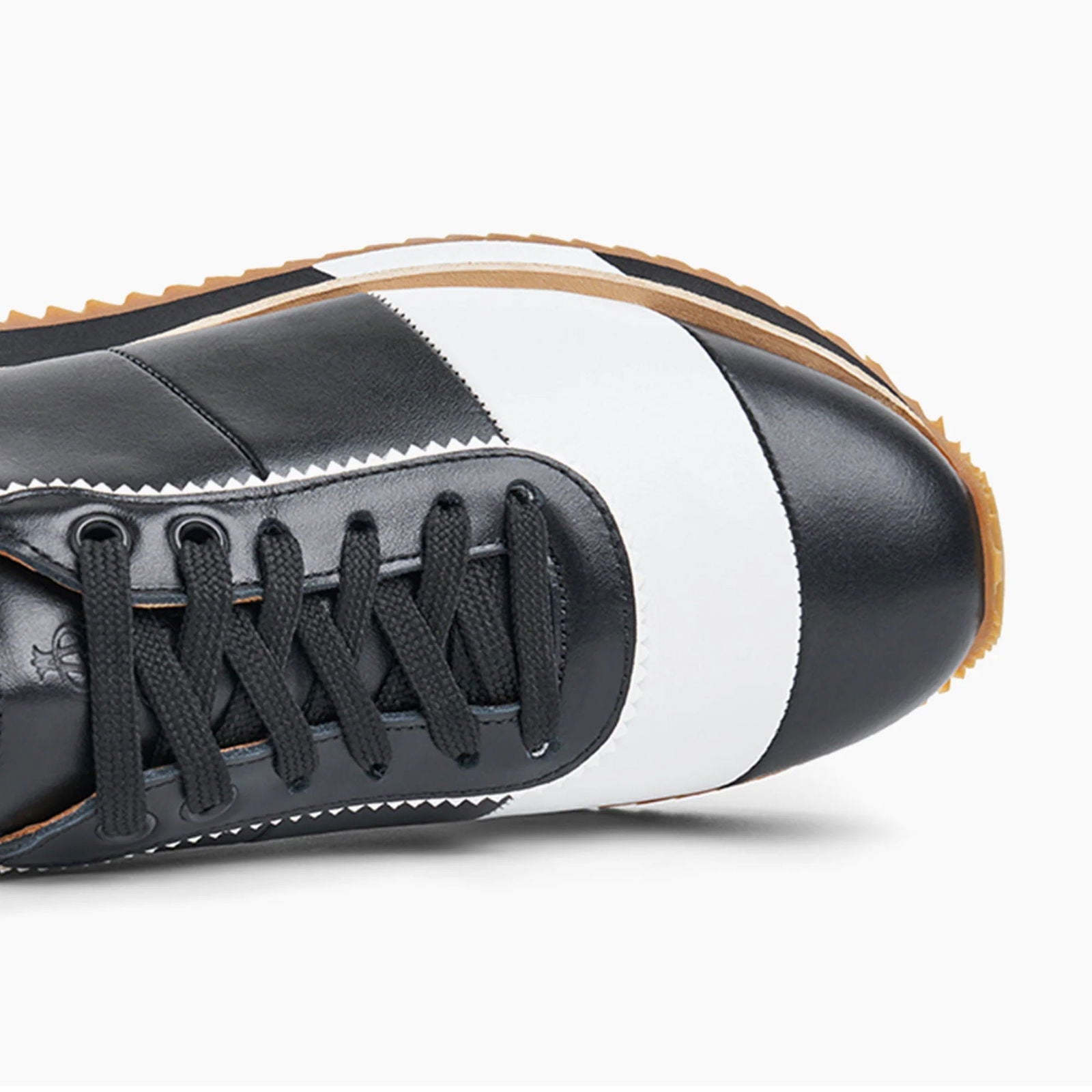 the Quinn Sneaker - Milanese Leather