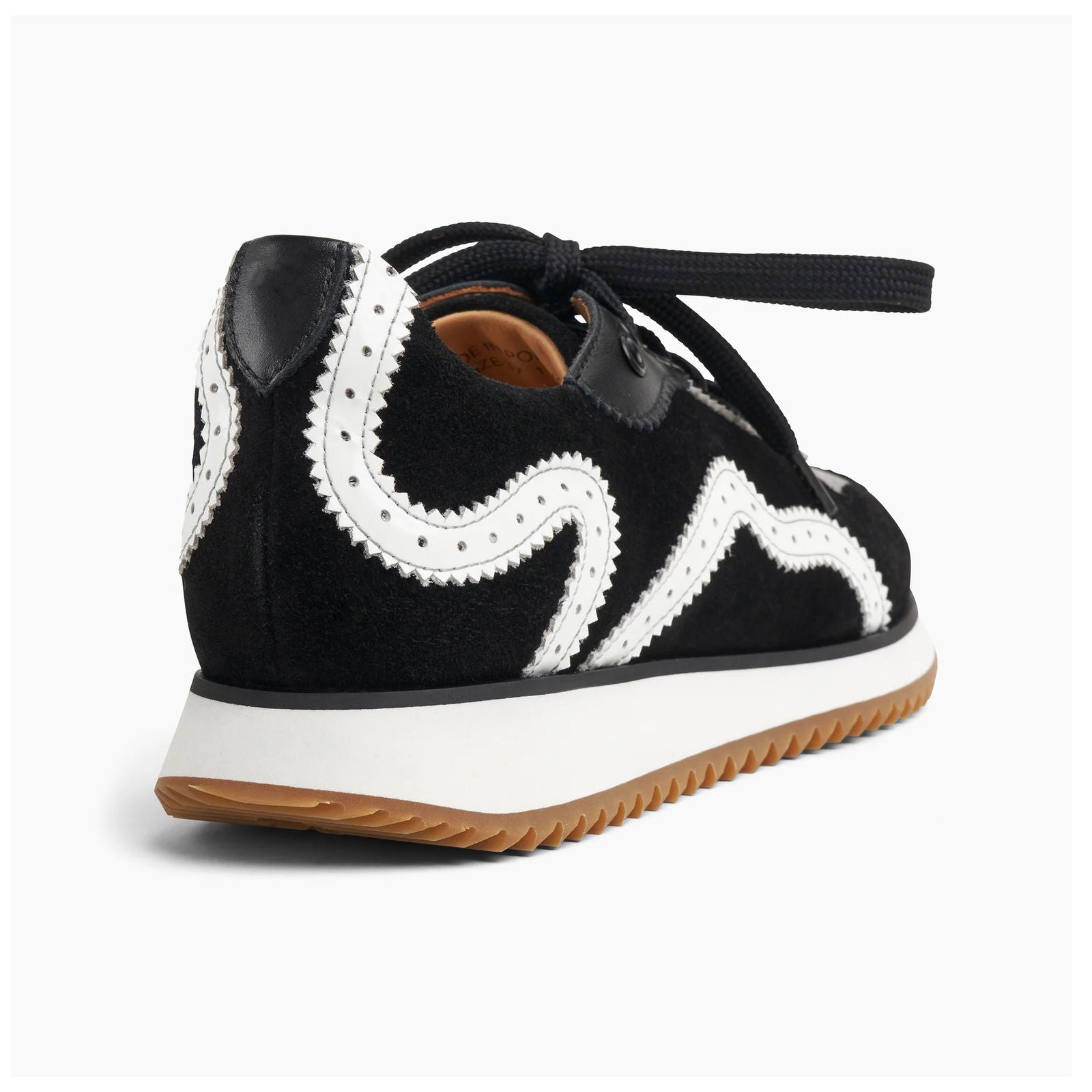 the Remi Sneaker Black - Milanese Leather